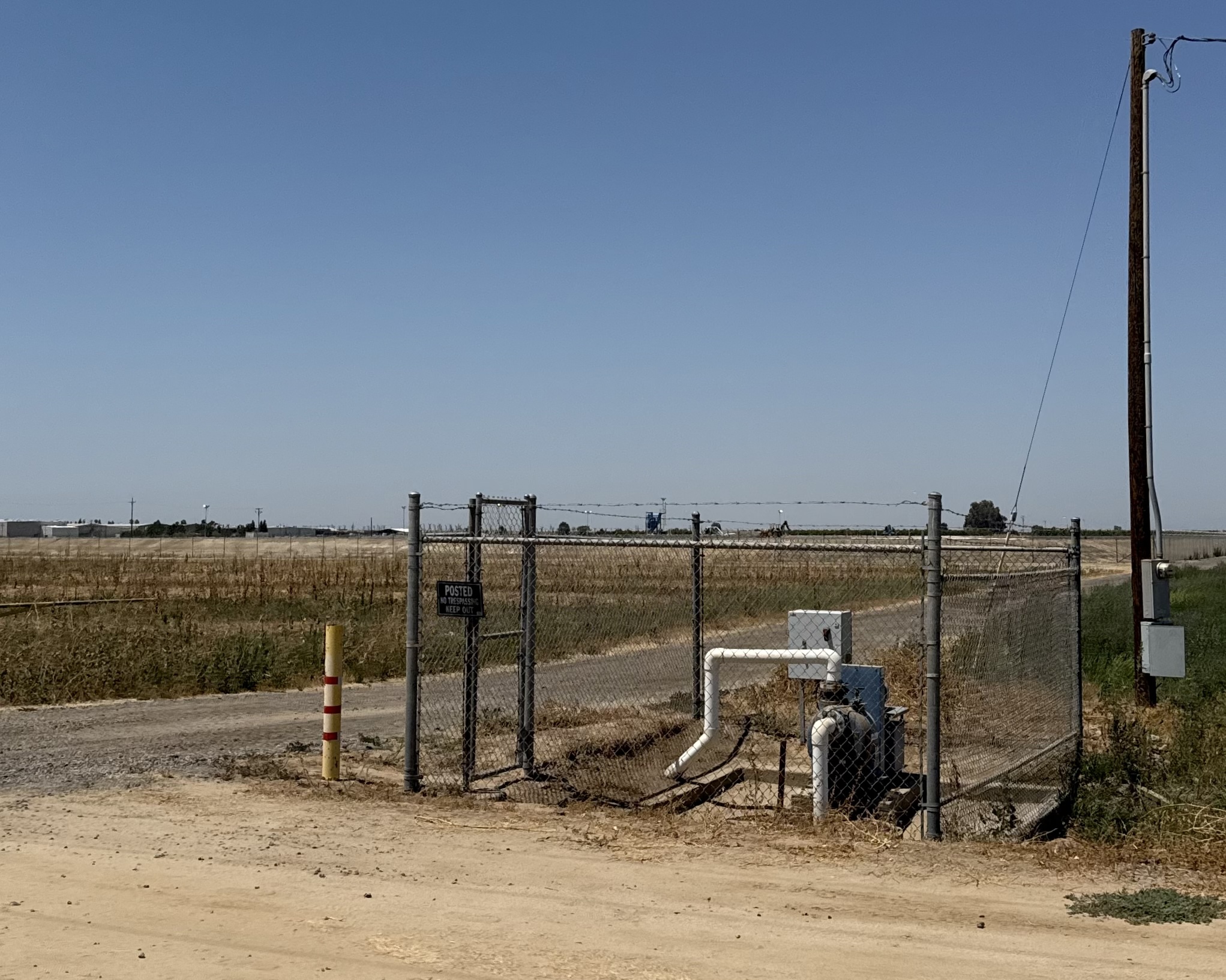 The wastewater pond from afar. Photo by author.
