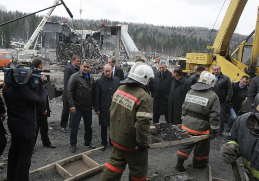 Prime Minister Vladimir Putin and Minister of Emergency Situations Sergei Shoigu at the Raspadskaya Mine, 11 May, 2010. http://archive.premier.gov.ru/events/news/10530/photolents.html.