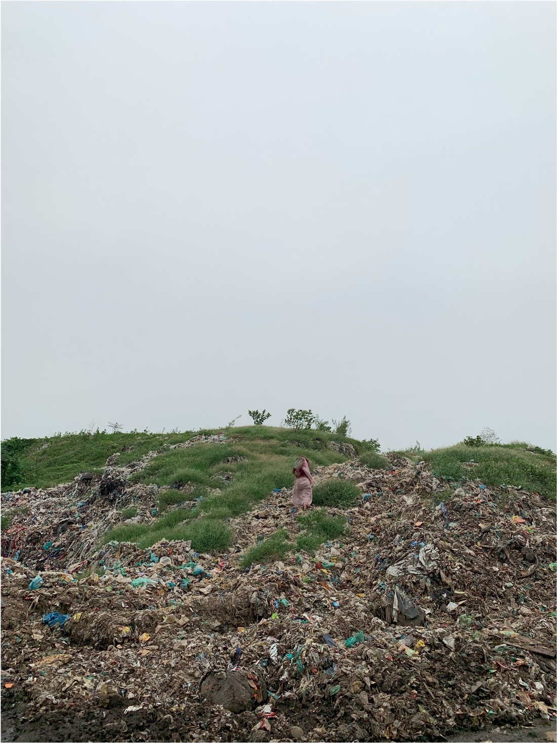 A road in-progress of being built alongside the landfill. © Dev Patel, 2023