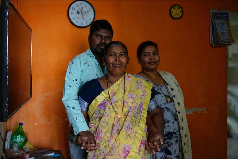 Baida Gaikwad from KKPKP/SWaCH at home with her kids, Vidya Kulkarni.