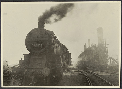 A trainload of iron ore arrives at the Stalino iron and steel plant. http://id.lib.harvard.edu/images/8001595976/urn-3:FHCL:33042244/catalog