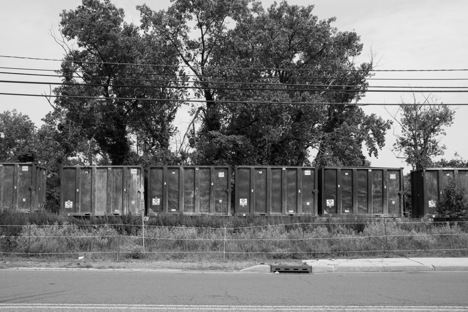 Freight cars loaded with trash await movement west from IWS's South Kearny terminal. 07/2021