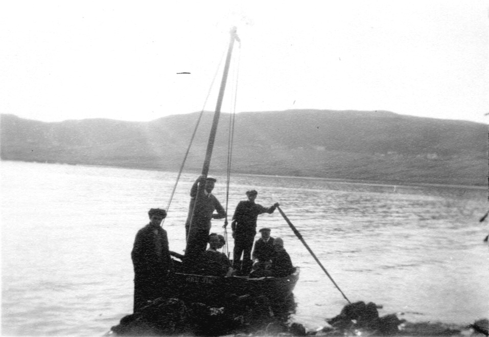 Black and white photograph of a fishing boat from Tiree. An Iodhlann.